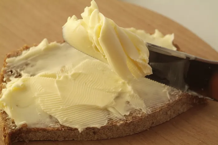Impresión enmarcada : Pan con mantequilla.