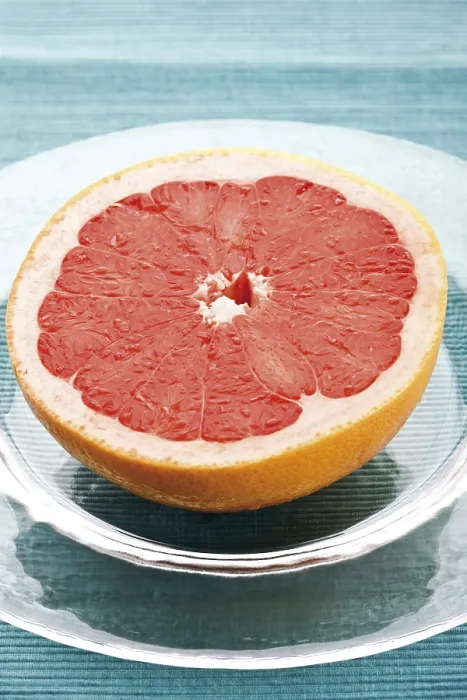 Impresión enmarcada : Media de una naranja roja, Ruby Star. Impresión enmarcada : Media de una naranja roja, Ruby Star.