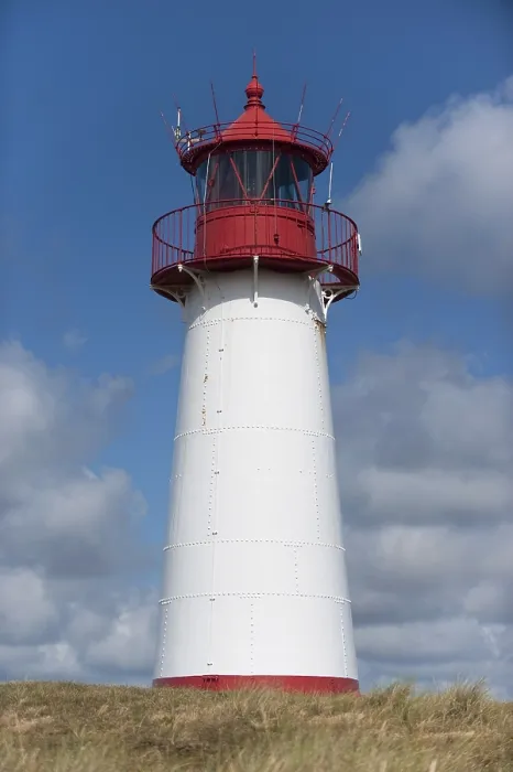 Impresión enmarcada : Faro con cielo azul en Ellenbogen. Impresión enmarcada : Faro con cielo azul en Ellenbogen.
