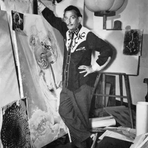 Salvador Dali in Studio with Enlarged Sea-Urchin Print, 1958