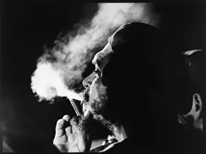 Che Guevara fumando tabaco