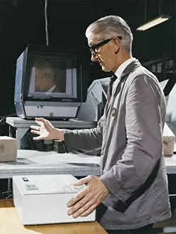 Historical Factory Images Imprime: Factory worker operating control box