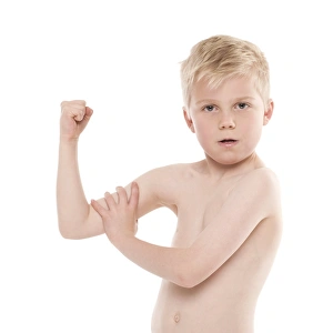 Impresiones de Modelo liberado, niño estirando sus bíceps Imágenes fechadas en noviembre de 2009: Hombre estirando sus bíceps