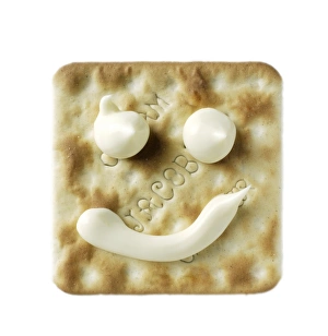 Impresiones de El crackers con una cara sonriente dibujada en queso Imágenes de octubre de 2008: Cracker