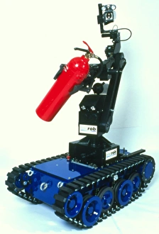 Impresiones de El robot bombero robótico. El robot diseñado para combatir incendios en áreas peligrosas como plantas químicas o reactores nucleares Imágenes fechadas en febrero de 1998: Robo de combate contra incendios