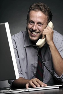 Man Working On Computer Imprime: Office worker