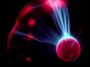 Impresiones de Globo de plasma. Láminas de luz dentro del globos de plasmas. Este juguete es una pelota de vidrio hueco que contiene un gas inerte a baja presión Imágenes fechadas en 1999: Corrientes de luz dentro de un esfera plasmática