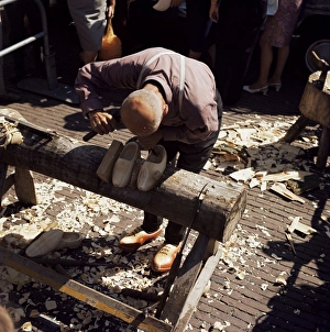 European Craftsmanship Imprime: Man making clogs