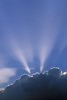 Clouds And Sunlight Imprime: Sun rays through clouds