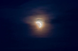 Partial Lunar Eclipse Imprime: May 26, 2021 - Partial lunar eclipse in clouds