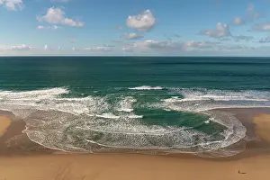 England Beach Scenes Imprime: A rip current developing on a beach during a flooding tide