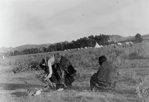 Native American Rituals Imprime: Offering pipe to the skull-Cheyenne, c1910. Creator: Edward Sheriff Curtis