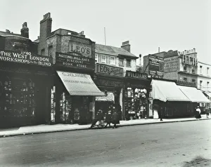 Kensington High Street History Imprime: Row of shops including the West London Workshops for the Blind, London, 1913