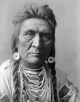 Traditional Tribal Clothing Imprime: Wolf, c1908. Creator: Edward Sheriff Curtis