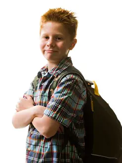 Caucasian Boy Looking At Camera Imprime: Boy with backpack