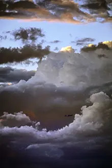 Passenger Plane Photography Imprime: Airplane in front of a cloud