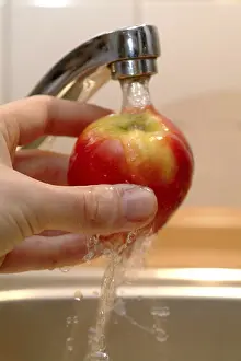 Healthy Dessert Ideas Imprime: An apple being washed