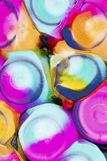 Colorful Design Imprime: An array of vibrant, abstract ink patterns featuring a mixture of bright pink