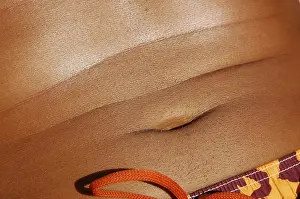 Skin Protection Tips Imprime: Bellybutton of a man