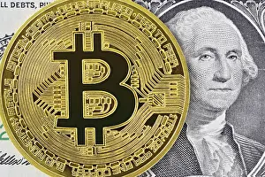 Electronic Money Transfer Imprime: Bitcoin and a US Dollar Note