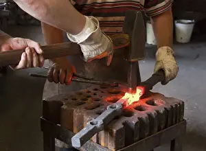 Berlin Germany Imprime: Blacksmith and his assistant at work
