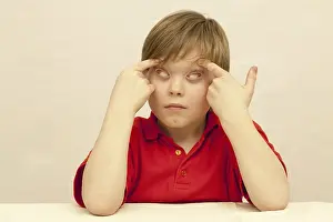 Caucasian Boy Portrait Imprime: Boy making a face