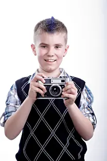 Dark Studio Shot Imprime: Boy with old camera