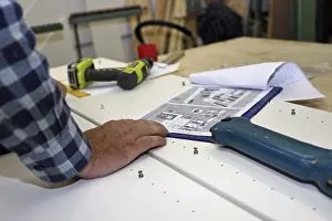 Carpenter At Work Imprime: Carpenter at work in his carpentry workshop