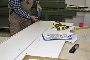 Carpenter At Work Imprime: Carpenter at work in his carpentry workshop