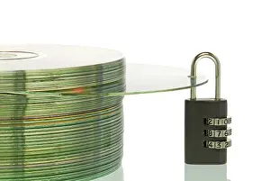 Data Theft Prevention Imprime: CD stack with a CD and a padlock