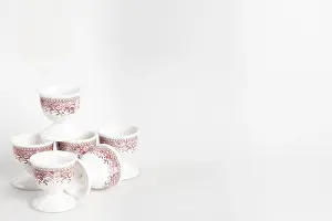 Bright Studio Background Imprime: Ceramic egg cup with reddish pattern on white background