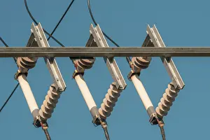 Ceramic Insulators Imprime: Ceramic eletric insulators outside on the sky background