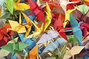 Colorful Bird Photography Imprime: A chaotic array of multicolored origami cranes overlapping each other