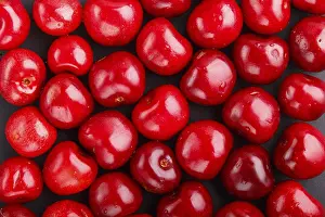 Flat Lay Concept Imprime: Cherry pattern on black background