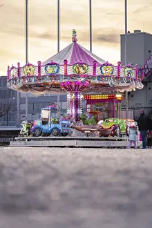Southern Germany Sunset Scene Imprime: Childrens carousel in the sunset