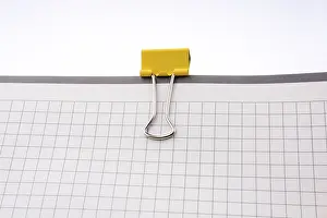 Reminder Notes Imprime: Clip on a checked notebook