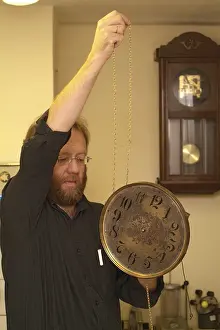 Watchmaker Profession Imprime: Clockmaker restore clock