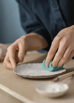 Hand Hygiene Practices Imprime: Close up hand using blue sponge