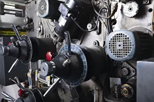 Industrial Equipment Imprime: Close-up on complex detail of typography machine
