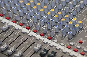 Professional Audio Equipment Imprime: Close-up on knobs of an audio console