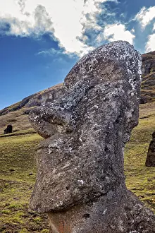 Pacific Ocean Rock Formations Imprime: Close-up of a Moai statue with dramatic cloudscape in the background