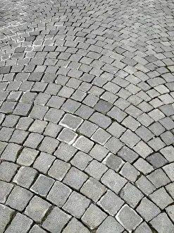 Urban Paving Stone Imprime: A cobblestone texture image
