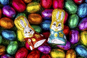 Chocolate Easter Eggs Imprime: Colourful Easter sweets on grass