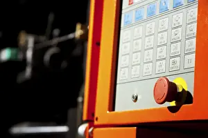 Industrial Building Design Imprime: Complex machine computer control panel with emergency button