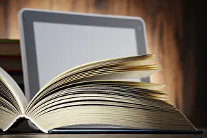 Modern Educational Institution Imprime: Composition with books and tablet computer