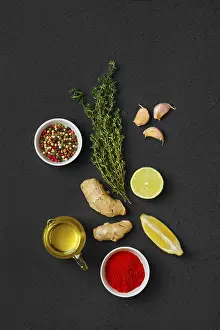 Colorful Vegetarian Dish Imprime: Composition with condiments on black background