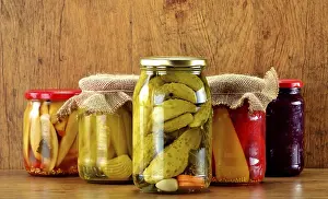 Deserted Table Setting Food Imprime: Composition with jars of pickled vegetables