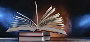 Empty Library Setting Imprime: A composition with an open book lying on a stack of other books