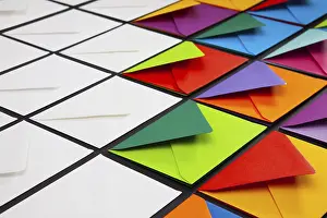 White Envelopes Imprime: Composition with white and colored envelopes on the table