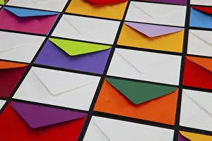 White Envelopes Imprime: Composition with white and colored envelopes on the table